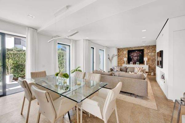 Dining area and living area in apartment in Portals Nous 2