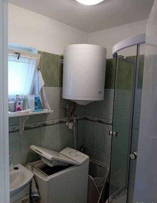 Balatoni_telek_nyaralohazzal_elado_414492496590071