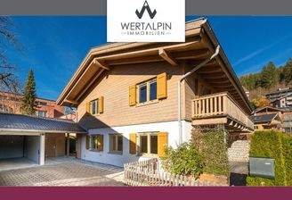 Moderne Doppelhaushälfte im alpinen Stil  