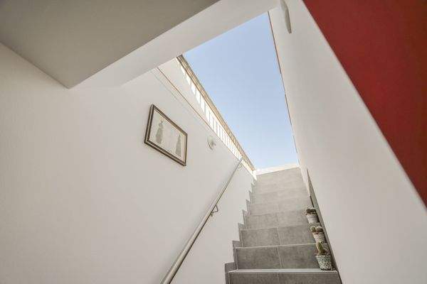 The rooftop terrace opens up via an electrically o