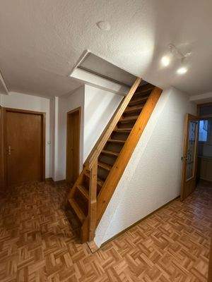 Treppenaufgang in den Spitzboden