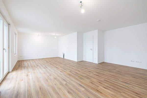 Wohn- und Esszimmer mit offener Küche