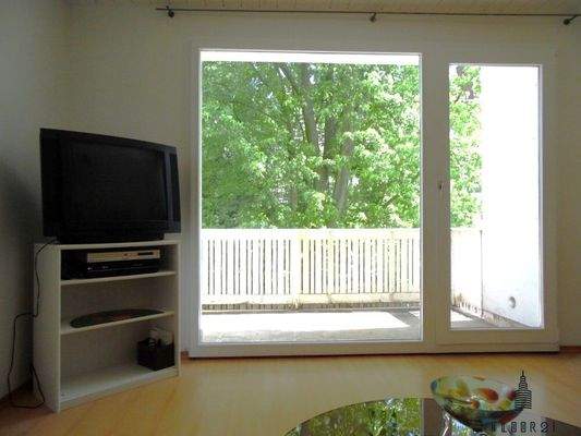 Wohnzimmer mit Balkon