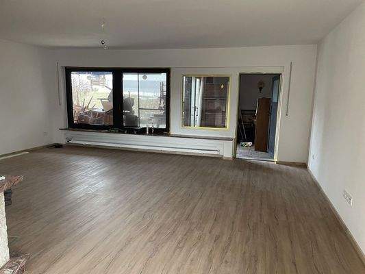 Wohnzimmer mit Wintergarten