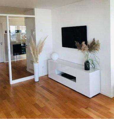 Wohnzimmer mit Glasabtrennung