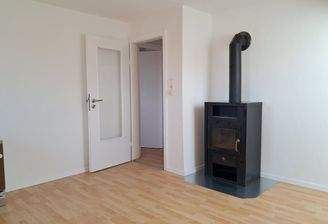 Wohnzimmer mit Kamin