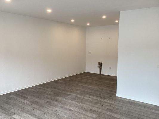 Wohnzimmer mit offene Küche 