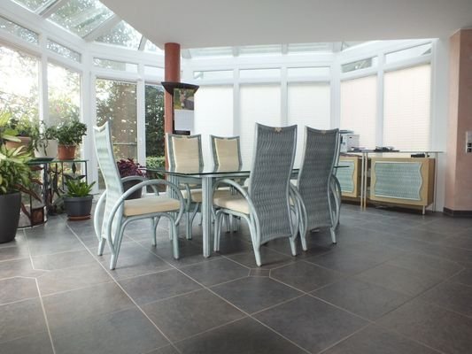 Esszimmer mit intergriertem Wintergarten