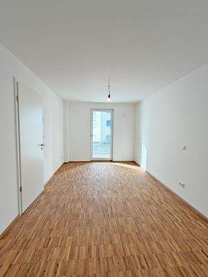 Schlafzimmer mit Balkonzugang