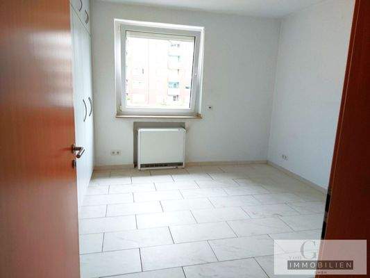 Schlafzimmer mit Einbauschrank