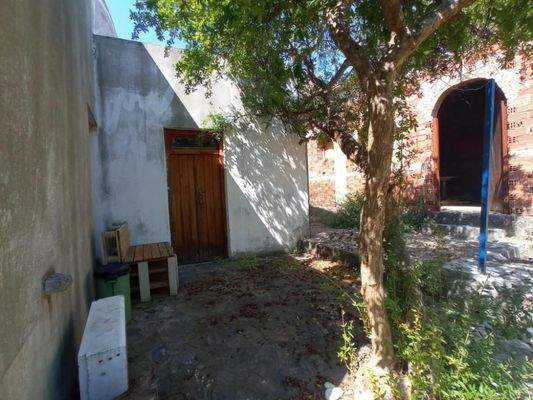 Kreta, Neapoli: Großes Steinhaus mit unvollendetem Gästehaus, Olivenhain und Garten zu verkaufen