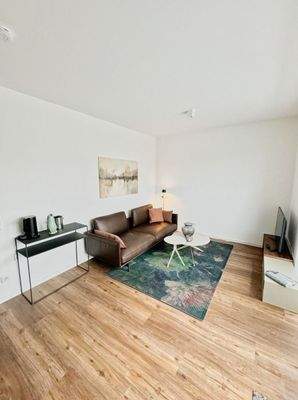 Der ansprechend möblierte Wohnbereich...