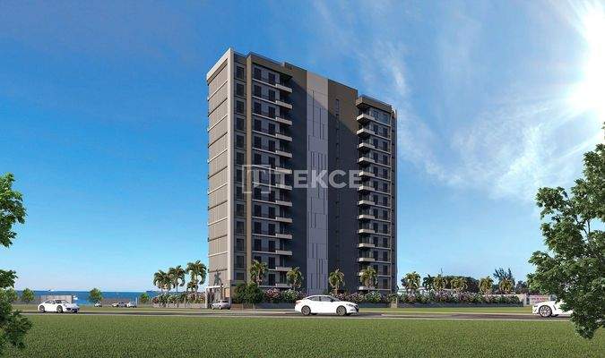 New Apartments in Mersin with a Pool and Modern Landscaping