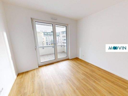 Schlafzimmer mit angrenzendem Balkon