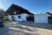 Hausfront mit Garage und Eingangsbereich
