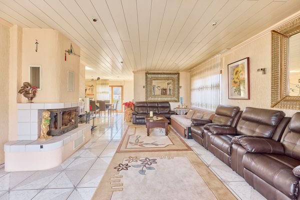 Wohnzimmer mit Kamin - Einfamilienhaus 