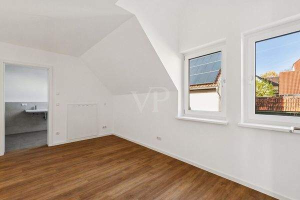 Schlafzimmer mit Bad en suite