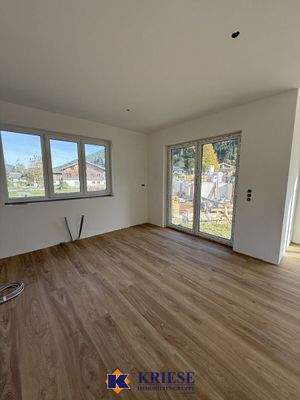 Wohnzimmer mit Gartenzugang