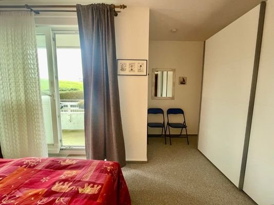 Schlafzimmer mit Balkonzugang