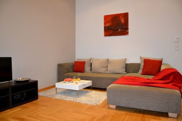 Large living room with parquet floor
