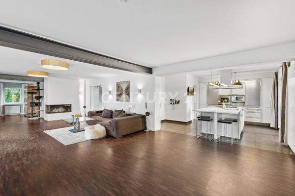 Offene Raumgestaltung zwischen Wohnzimmer und Küche