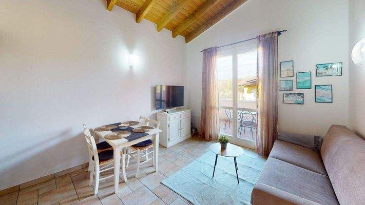 AM-056-Bilocale-in-residence-con-piscina-Living-Ro