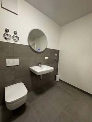 Badezimmer mit Waschmaschinenanschluss