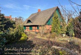 Umfassend saniertes Kolonistenhaus in grüner Dorf