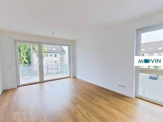 Ansicht I: Wohn- und Esszimmer mit offenem Küchenbereich