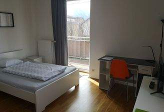 Schlafzimmer mit Balkon