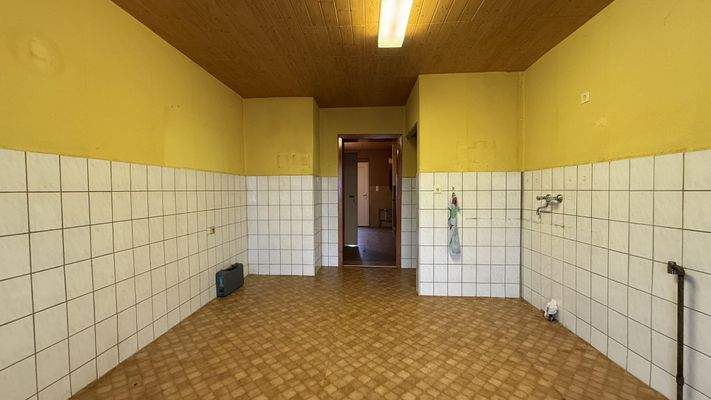 Küche mit Zugang zum Wintergarten