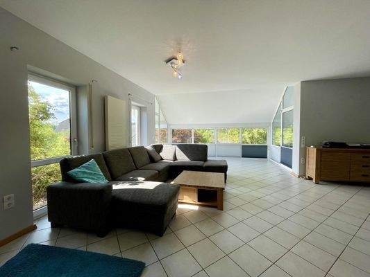 Wohnzimmer mit Wintergarten