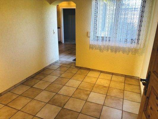 Esszimmer mit offener Verbindung zur Küche