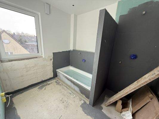 Bad mit Dusche und Wanne