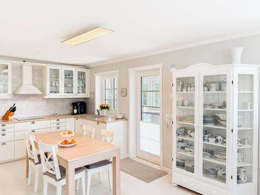 Küche mit Ausgang zur Veranda