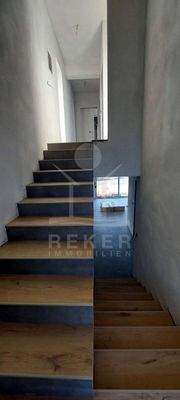 Obergeschoss: 2 Schlafzimmer mit jeweils eigenem Bad & die Waschküche