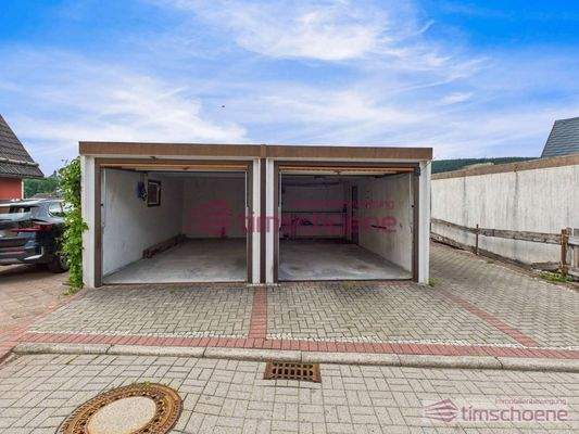  Doppelgarage  + Pkw-Stellplatz