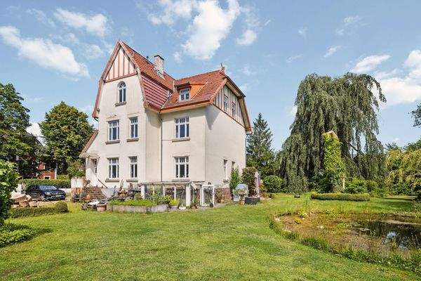 mit Glasgewächshaus