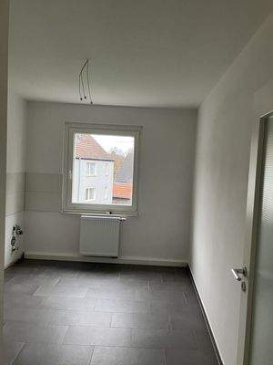 Küche mit Fliesenspiegel