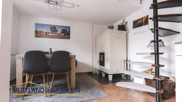 Wohnzimmer mit Kachelkamin