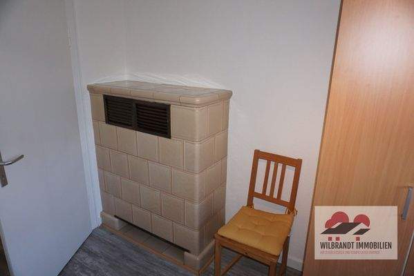 Kachelofen - vom Flur aus beheizbar