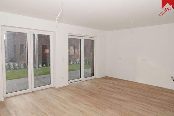 Wohn- und Essbereich mit Zugang zur Terrasse