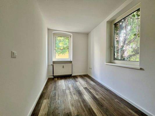 Seitenhaus - Wohnung im OG