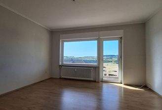Schlafzimmer mit Balkonzugang
