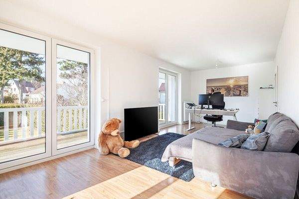 OG Wohnzimmer mit Balkonzugang