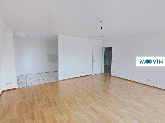 Ansicht III: Wohn- und Esszimmer mit offenem Küchenbereich