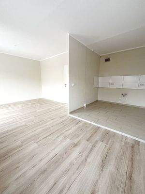 Wohnzimmer - offene Küche - Musterbild.jpg