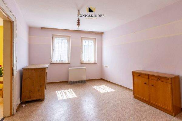 Schlafzimmer- Rückzugsort mit Ruhe – großzügiges Schlafzimmer mit Blick ins Grüne