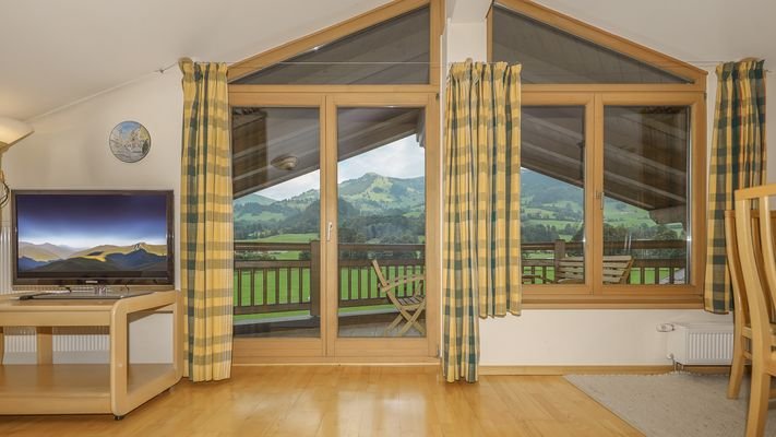 KITZIMMO-Dachgeschosswohnung mit Kaiserblick - Immobilien Aurach.