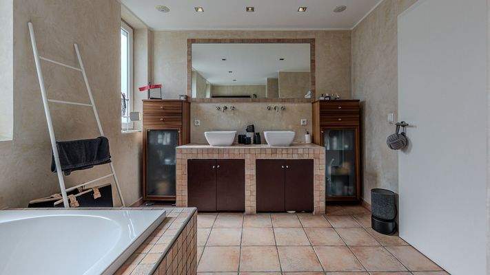 KITZIMMO-Hochwertige Haushälfte am Golfplatz kaufen - Immobilien Kitzbühel.